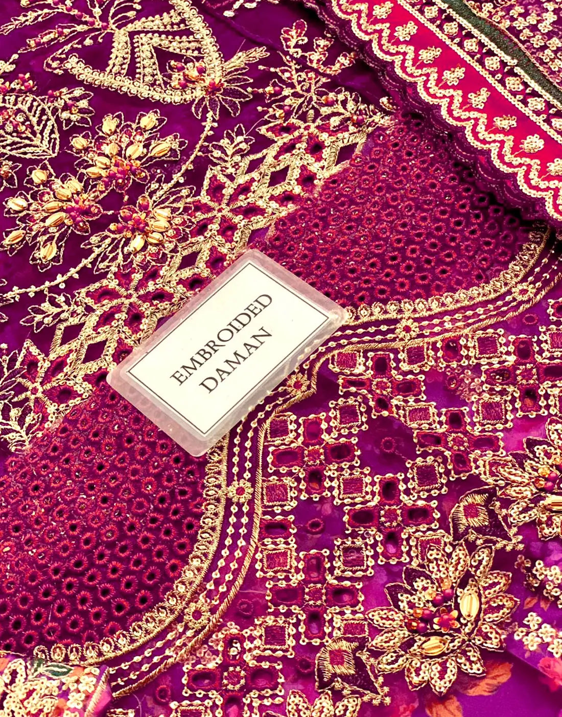 Glamorous Embroidered Magenta Chiffon Bridal Lehenga with Rich Embellishments